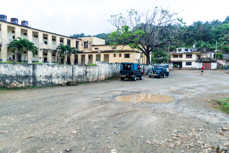 BARACOA, CUBA - FEB 6, 2016: Truck and shared cars  station in Baracoa town.のeditorial素材