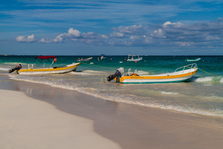 TULUM, MEXIO - FEB 29, 2016: Boats at the Caribbean beach in Tulum, Mexicoのeditorial素材