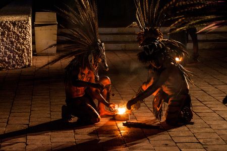 CHICHEN ITZA, MEXICO - FEB 25, 2016: Native mayan dancer performance near Chichen Itza ruins.のeditorial素材