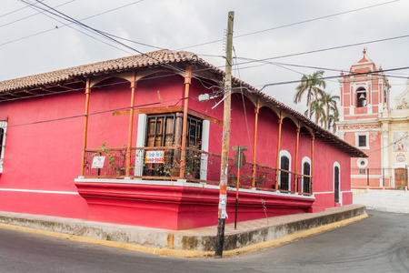 LEON, NICARAGUA - APRIL 25, 2016: View of a colorful colonial house of Antiguo Orfanato (Old...