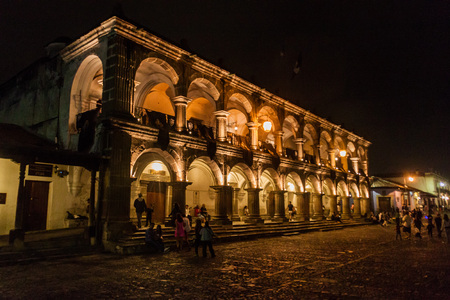 ANTIGUA, GUATEMALA - MARCH 26, 2016: Night view of Palacio del Ayuntamiento in Antigua Guatemala town, Guatemala.のeditorial素材