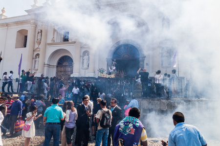 ANTIGUA, GUATEMALA - MARCH 27, 2016: Participants of a procession on Easter Sunday in Antigua Guatemala city.のeditorial素材