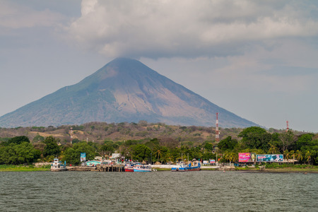 MOYOGALPA, NICARAGUA - MAY 1, 2016: View of Myogalpa village port at Ometepe island, Nicaragua. Volcano Concepcion in the background.のeditorial素材
