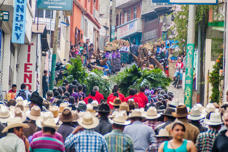 SAN PEDRO LA LAGUNA, GUATEMALA - MARCH 23, 2016: Local people of San Pedro La Laguna village attend a procession before Easter.のeditorial素材