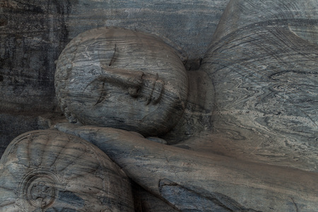 Reclining Buddha statue at Gal Vihara rock temple in the ancient city Polonnaruwa, Sri Lankaのeditorial素材
