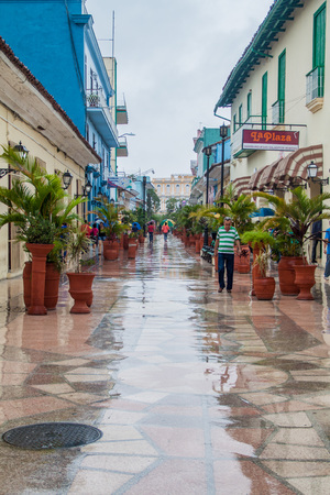 SANCTI SPIRITUS, CUBA - FEB 7, 2016: People walk at the pedestrian zone in Sancti Spiritus, Cubaのeditorial素材