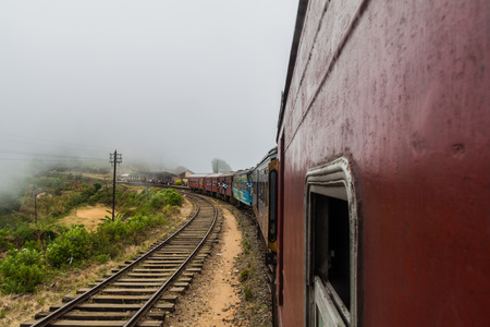 IDALGASHINNA, SRI LANKA - JULY 16, 2016: Local train in a railway station in Idalgashinna village.のeditorial素材