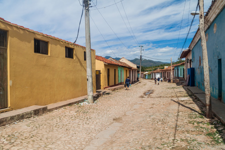 TRINIDAD, CUBA - FEB 8, 2016: People at a cobbled street in the center of Trinidad, Cuba.のeditorial素材