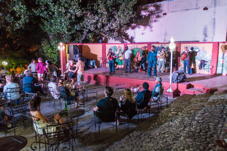 TRINIDAD, CUBA - FEB 8, 2016: People enjoy music performance in Casa de la Musica in Trinidad, Cuba.のeditorial素材