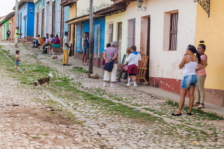 TRINIDAD, CUBA - FEB 8, 2016: People on a cobbled street in the center of Trinidad, Cuba.のeditorial素材