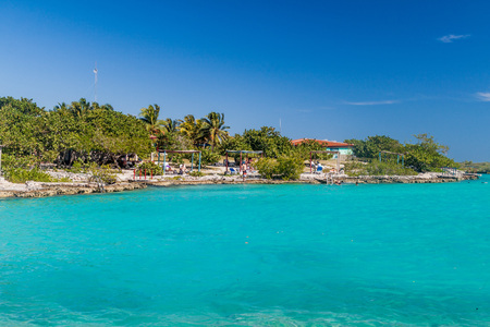 PLAYA GIRON, CUBA - FEB 15, 2016: Tourists enjoy the seaside resort Caleta Buena at Bay of Pigs near Playa Giron village, Cuba.のeditorial素材