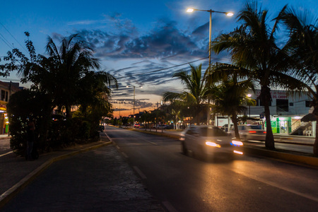 TULUM, MEXICO - MARCH 1, 2016: Night view of a main road in Tulum, Mexico.のeditorial素材