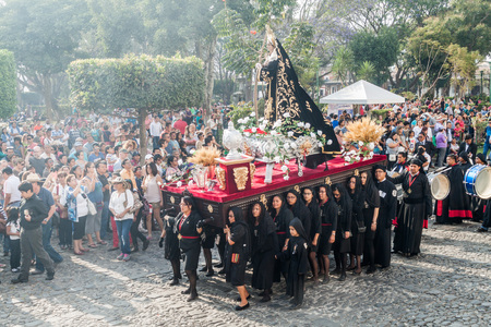 ANTIGUA, GUATEMALA - MARCH 26, 2016: Participants of the procession on Holy Saturday (Black Saturday) in Antigua Guatemala town, Guatemala.のeditorial素材