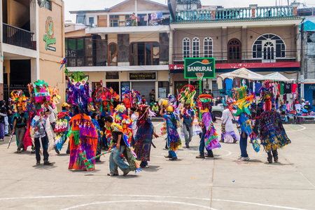 SANTIAGO ATITLAN, GUATEMALA - MARCH 24, 2016: Native people in colorful clothes in front of the...