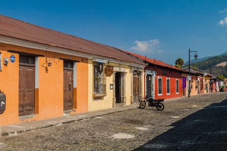ANTIGUA, GUATEMALA - MARCH 27, 2016: View of a cobbled street in Antigua Guatemala city.のeditorial素材
