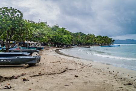 PUERTO VIEJO DE TALAMANCA, COSTA RICA  - MAY 18: Boats on a beach in Puerto Viejo de Talamanca village, Costa Ricaのeditorial素材