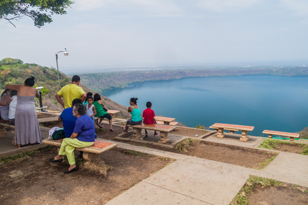 CATARINA, NICARAGUA - APRIL 29, 2016: People at a lookout over Laguna de Apoyo lake, Nicaraguaのeditorial素材