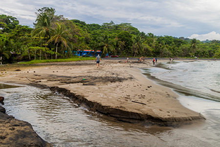 PUERTO VIEJO DE TALAMANCA, COSTA RICA  - MAY 16: People on a beach in Puerto Viejo de Talamanca village, Costa Ricaのeditorial素材