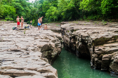 GUALACA, PANAMA - MAY 23, 2016: Tourists visit Los Cangilones de Gualaca - mini canyon in Panamaのeditorial素材
