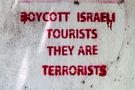 MALE, MALDIVES - JULY 11, 2016: Writing "Boycott Israeli tourists, they are terrorists" on a wall in Male, Maldives.のeditorial素材