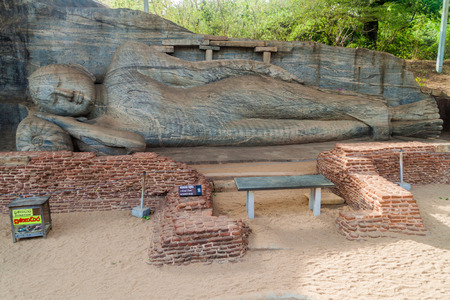 Reclining Buddha statue at Gal Vihara rock temple in the ancient city Polonnaruwa, Sri Lankaの写真素材