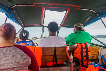 ALMIRANTE, PANAMA - MAY 19, 2016: People on a ferry traveling from Almirante village on the mainland to Bocas del Toro town on Colon island.のeditorial素材