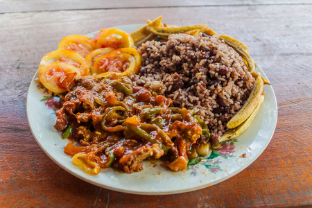 Meal in Nicaragua. Rice and beans, bananas, vegetables.の写真素材