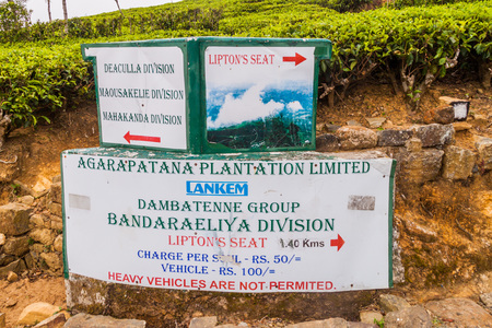 DAMBATENNE, SRI LANKA - JULY 15, 2016: Information sign on a road in tea plantations of Dambatenne village.のeditorial素材