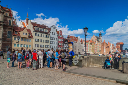 GDANSK, POLAND -  SEPTEMBER 2, 2016: Tourists on Green Bridge over Motlawa river in Gdansk, Poland.