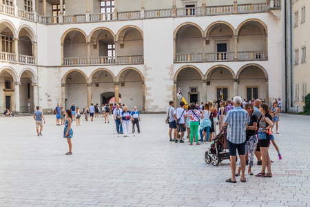 KRAKOW, POLAND - SEPTEMBER 3, 2016: Tourists visit a courtyard of the Wawel castle in Krakow, Polandのeditorial素材
