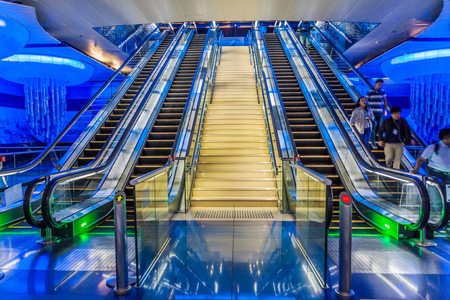 DUBAI, UAE - MARCH 7, 2017: Escalators of BurJuman metro station in Dubai, UAE.のeditorial素材