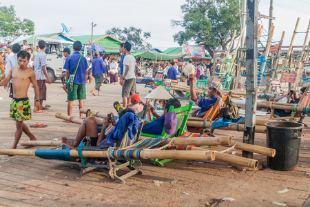 MT KYAIKTIYO, MYANMAR - DECEMBER 11, 2016: Porters relaxing in their chairs at Mt Kyaiktiyo (Golden Rock), Myanmarのeditorial素材