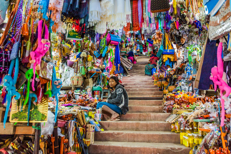 MT POPA, MYANMAR - DECEMBER 8, 2016: Trinket and souvenir sellers at the stairway to Mt Popa, Myanmarのeditorial素材