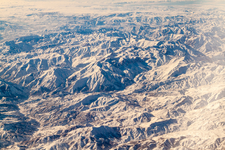 Aerial view of snow covered mountains in northeastern Iranの写真素材