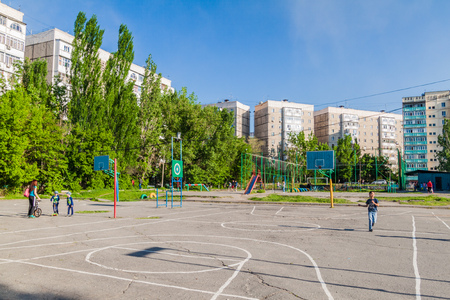 BISHKEK, KYRGYZSTAN - MAY 11, 2017: Playground in Vostok 5 neighborhood in Bishkek, capital of Kyrgyzstan.のeditorial素材