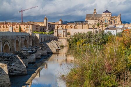 Mosque-Cathedral and Roman Bridge in Cordoba, Spainの写真素材
