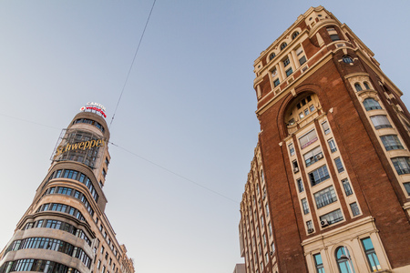 MADRID, SPAIN - OCTOBER 21, 2017: Palacio de la Prensa and Carrion Building in Madrid.のeditorial素材
