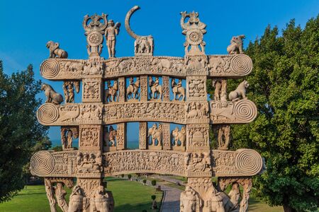 Gateway (Torana) of the Great Stupa, ancient Buddhist monument at Sanchi, Madhya Pradesh, Indiaの写真素材