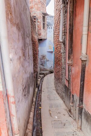 Narrow alley in Lucknow, Uttar Pradesh state, Indiaの写真素材