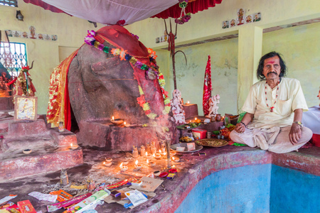 KAZIRANGA, INDIA - JANUARY 29, 2017: Priest in Ganesh Temple near Kaziranga village, Asam state.のeditorial素材