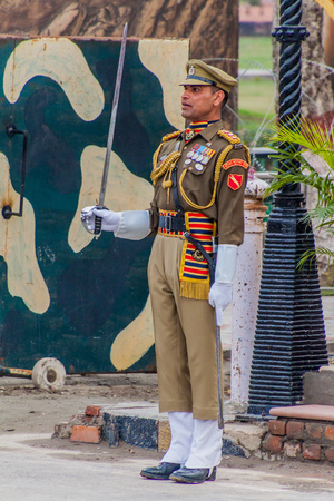 WAGAH, INDIA - JANUARY 26, 2017: Border Security Force member at the military ceremony at India-Pakistan border in Wagah in Punjab, India.のeditorial素材