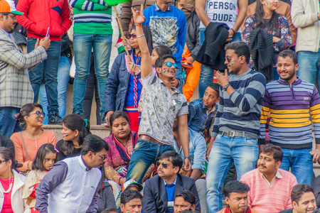 WAGAH, INDIA - JANUARY 26, 2017: Spectators enjoy the military ceremony at India-Pakistan border in Wagah in Punjab, India.のeditorial素材