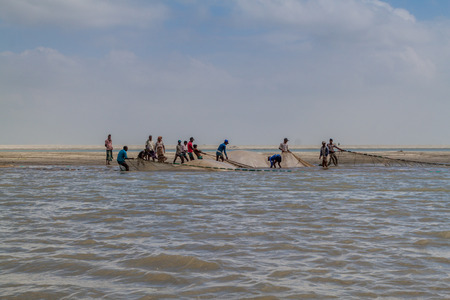 JAMUNA, BANGLADESH - NOVEMBER 7, 2016: Local fishermen on in Jamuna river, Bangladesh