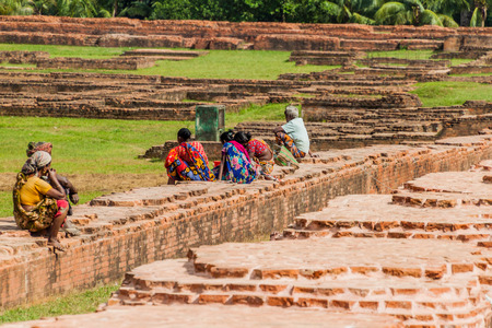 PAHARPUR, BANGLADESH - NOVEMBER 6, 2016: Local people at Somapuri Vihara (Somapura Mahavihara), ruins of Buddhist monastic complex in Paharpur village, Bangladeshのeditorial素材