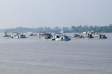 RUPSA, BANGLADESH - NOVEMBER 13, 2016: River sand mining dredgers on Rupsa river, Bangladeshのeditorial素材