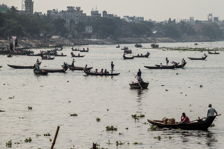 DHAKA, BANGLADESH - NOVEMBER 22, 2016: Small wooden boats at Buriganga river in Dhaka, Bangladeshのeditorial素材