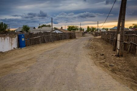 Street in former Aral Sea port town Moynaq (Moâynoq or Muynak), Uzbekistanの写真素材