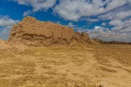 Earoded earthen walls of Ayaz Qala fortress in Kyzylkum desert, Uzbekistanのeditorial素材