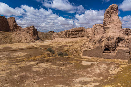 Eroded walls of Ayaz Qala fortress in Kyzylkum desert, Uzbekistanのeditorial素材
