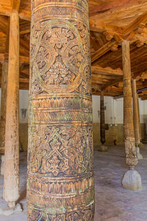 KHIVA, UZBEKISTAN - APRIL 25, 2018: Column of the Juma Mosque in the old town of Khiva, Uzbekistanのeditorial素材
